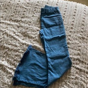 Teal fringe bell bottoms